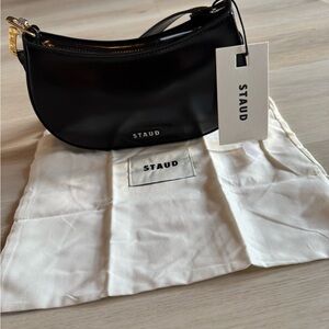 STAUD Black Leather Crescent Shoulder Bag with Gold Hardware
